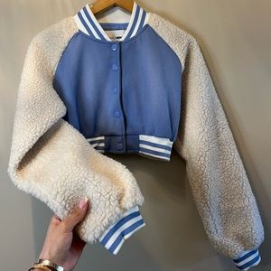 Bubbly blue varsity jacket.